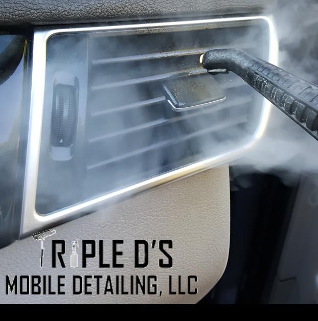 An employee at Triple D's Mobile Detailing, LLC